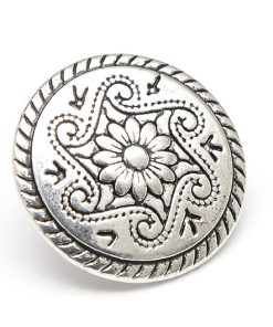Metallknapp med blomma
