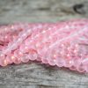 Frostade glaspärlor 8mm Rosa med guldskimmer