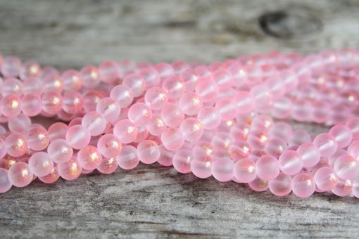 Frostade glaspärlor 8mm Rosa med guldskimmer