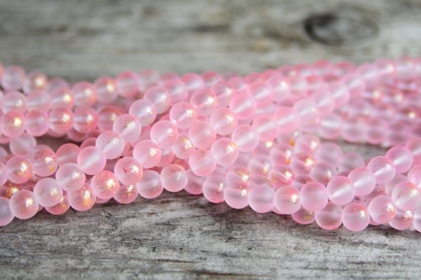 Frostade glaspärlor 8mm Rosa med guldskimmer