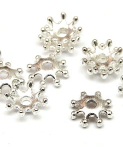 Silverpläterade pärlhattar Pistiller